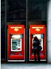 Bank Of America- street scene- hyperrealism acrylic painting by artist painter Gerard Boersma showing a a woman withdrawing cash at ATM machine