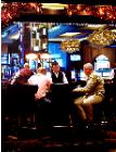 Card Players- hyperrealism acrylic painting by artist painter Gerard Boersma showing people playing cards in Las Vegas casino